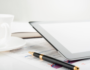 Tablet computer on a businessman workplace